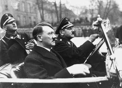 Adolf Hitler with his chauffeur Julius Schreck and Joseph Sepp Dietrich at his arrival in Potsdam on the occasion of the Potsdam day